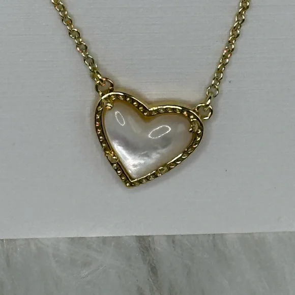 Kendra Scott Gold Heart Necklace with Ivory Mother of Pearl. - Picture 7 of 9